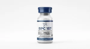 Professional product photograph of a clear glass vial containing BPC-157 5mg peptide powder with a UK supplied mark, sealed with a dark blue cap on a white background.