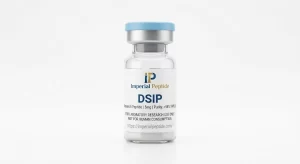 Professional product photograph of a clear glass vial containing DSIP 5mg research peptide powder with a light blue flip-off cap on a white background.
