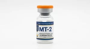 Professional product photograph of a clear glass vial containing lyophilized Melanotan II (MT-2) 10mg peptide powder, sealed with an orange flip-off cap, set against a seamless white background