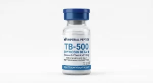 Professional product photograph of a clear glass vial containing TB-500 Thymosin Beta-4 10mg lyophilized peptide powder, sealed with a dark blue flip-off cap on a white background.
